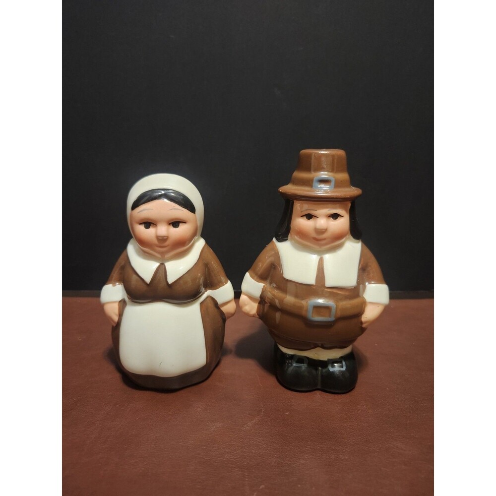 These are ceramic Publix Super Markets Pilgrim Salt & Pepper Shakers, typically